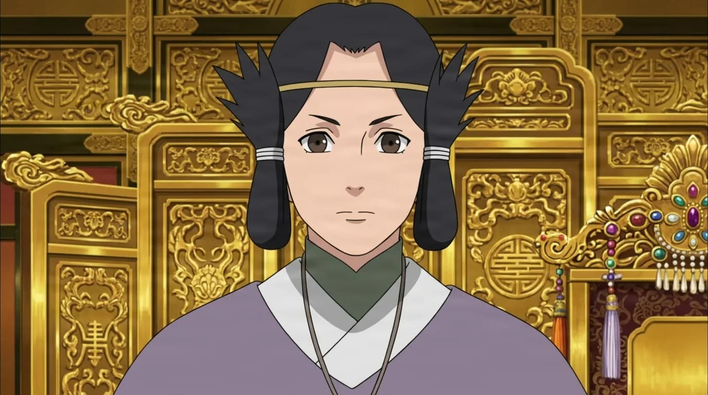 A dark haired person with looped side locks and a gold headband sits upright in an ornate golden throne hall beside a jeweled ornament.