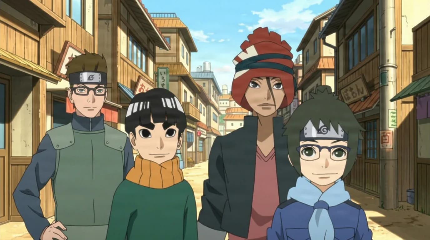 Four characters stand together in a sunlit wooden village street, including a bespectacled man, a boy in a green sweater, a person in a red cap, and a boy with glasses.