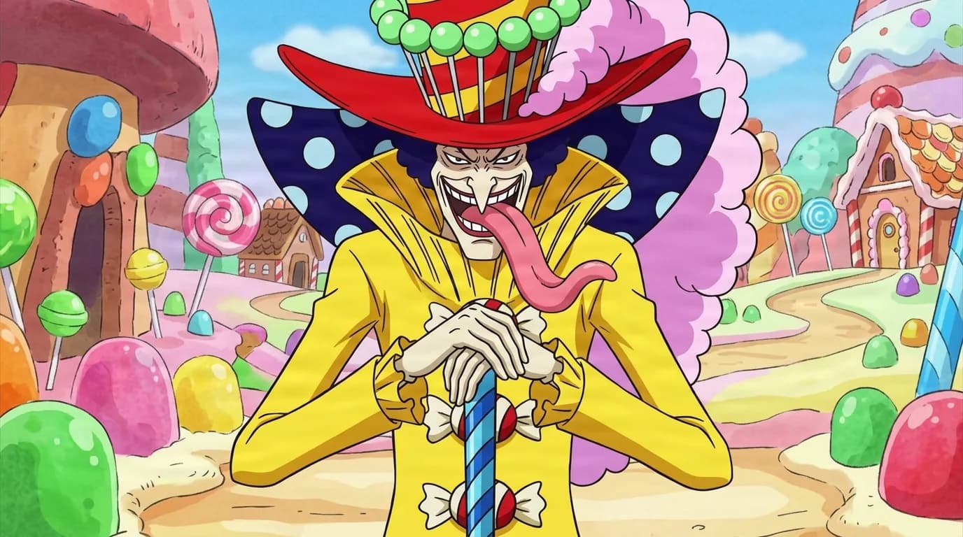 Grinning candy-themed pirate sticks out a very long pink tongue while leaning both hands on a striped candy staff, wearing a red cupcake-topped hat and a yellow coat in a colorful candy town.