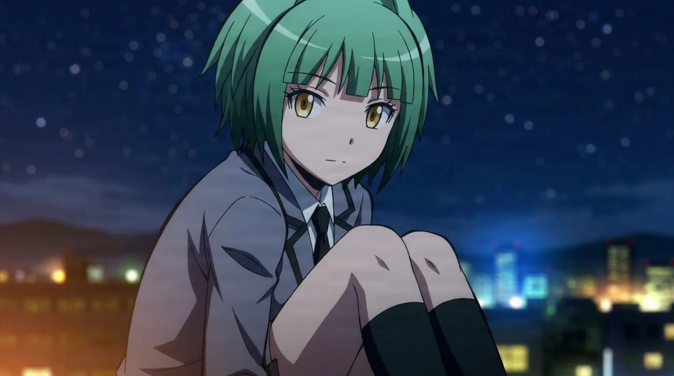Kaede Kayano hugs her knees while sitting on a rooftop at night, green hair framing her face against glowing city lights.