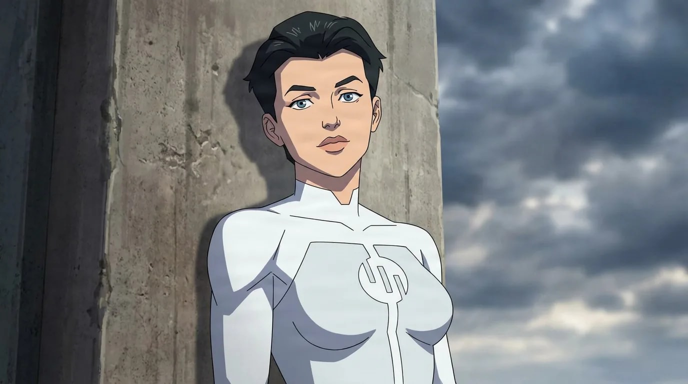 Anissa, a short-haired woman in a sleek white bodysuit, leans against a concrete pillar beneath a cloudy sky.