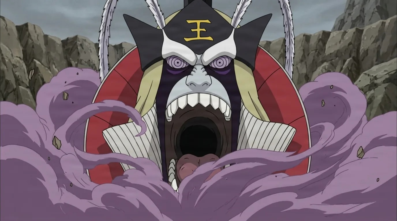 A towering demonic head summon with a crowned mask and gaping fanged jaws roars amid swirling purple mist in a rocky crater.