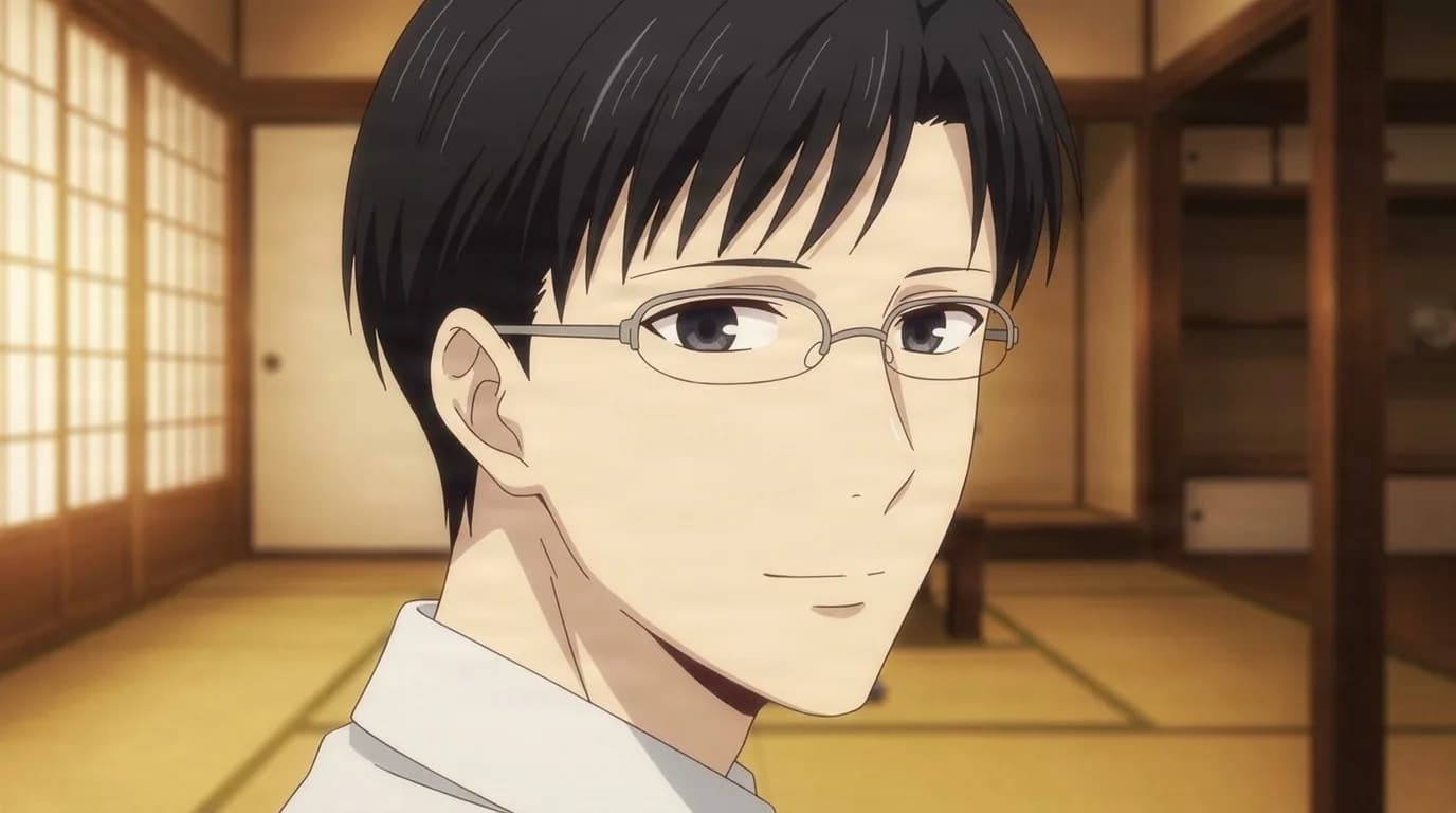 Saki's father, a black-haired man in thin-framed glasses and a white collared shirt, smiling faintly in a tatami room