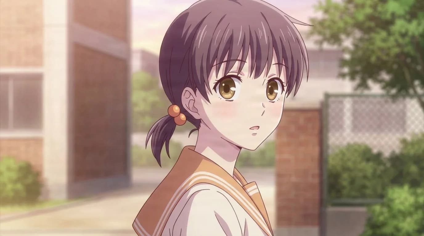 Tohru and Kyo's granddaughter, a girl with dark hair in a small side ponytail and an orange trimmed sailor uniform, glancing back outside a school